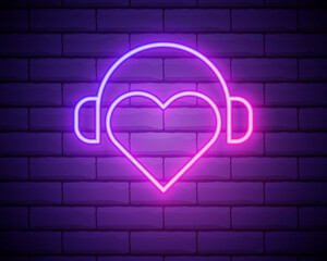 Neon Heart with headphones. Vector illustration of DJ heart icon with headphones in glowing neon style. Graphic element for decoration of Musical festival or Radio show