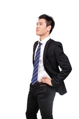 Portrait of a businessman standing with arms akimbo