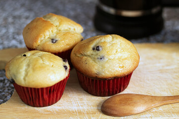 Blueberry muffins with red wrapinng