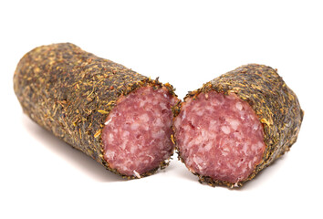 Log of Salami Coated in Herbs and Isolated on a White Background