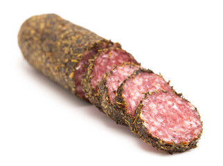 Log of Salami Coated in Herbs and Isolated on a White Background