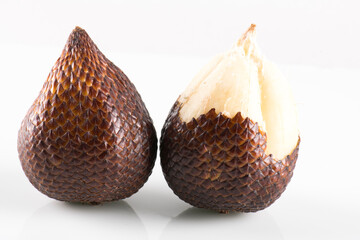 Salak or snake fruit isolated on white background.