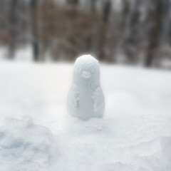 Snow penguin in winter landscape, building a different snowman, Square
