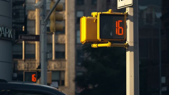New York City red traffic lights countdown numbers, Houston street signpost, sunny day