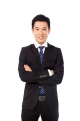 Portrait of a businessman standing with arms akimbo