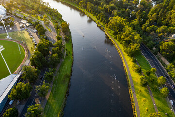 Aerial view of rowing teams on the Yarra Rive at sunrise in Melbourne, Australia