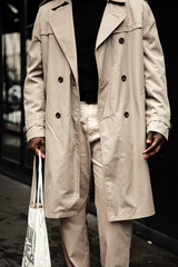  Fashion black man walking on street. Fashionable portrait of african american male model. Street style