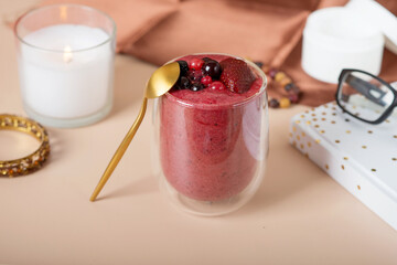 berry smoothie. cozy photo for a beauty blog