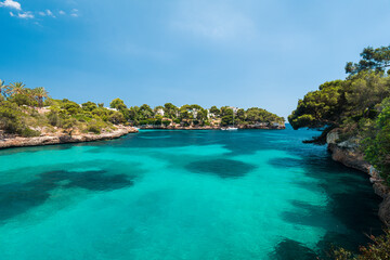 Fototapeta na wymiar A view from a trail on a shore of Cala Ferrera bay on Mallorca island in Spain