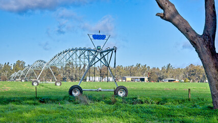 View of Farm Buildings with Centre-Pivot Irrigator in Front