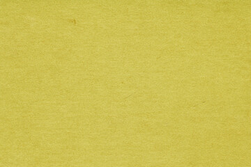 Vintage and old looking paper background. Retro cardboard texture. Grunge paper for drawing. Ancient book page.