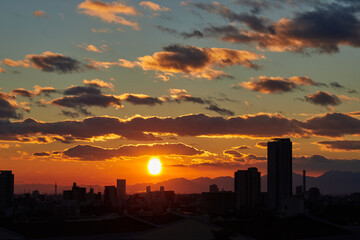 Naklejka na ściany i meble 冬の名古屋市上空の綺麗な夕焼けの風景