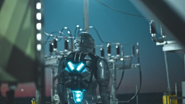 Our future and technologies. Back view of the astronaut standing at the power units station while working on sun energy farm at the evening or night. Alternative energy and solar farm concept
