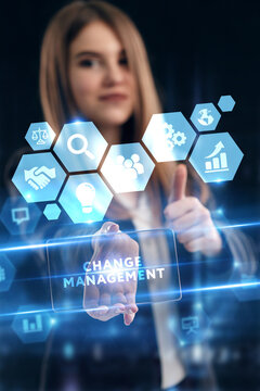 Business, Technology, Internet and network concept. Young businessman working on a virtual screen of the future and sees the inscription: Change management