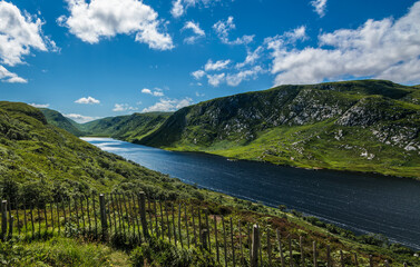 View of the river from the hill with remote and hauntingly beautiful wilderness of rugged Derryveagh Mountains in Glenveagh national park, Church Hill, Letterkenny, Co. Donegal, Ireland