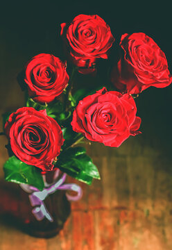 Bouquet of red roses with raindrops. Close up. Selective focus. Beautiful 