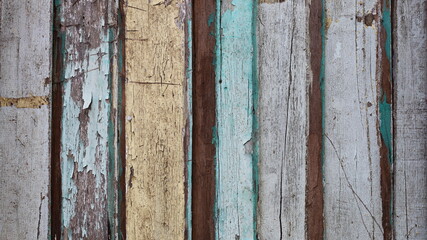 Colorful old wooden walls. Cracked wooden wall surface for background and vintage wallpaper. Selective focus