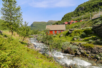 Rustic farm houses in the mountain valleys along the Flam railway en route to Myrdal Norway