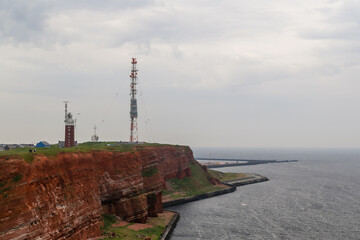 Fototapeta na wymiar Scenery along the iconic red cliffs of Helgoland in the Waddell Sea off the coast of Germany