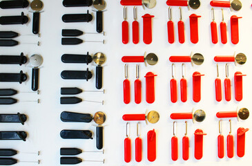 Empty white plastic plate, cup, fork and spoon over white background with copy space. Dining set of plastic cutlery on white Flat lay. and a place for food objects. plastic plates and glasses of