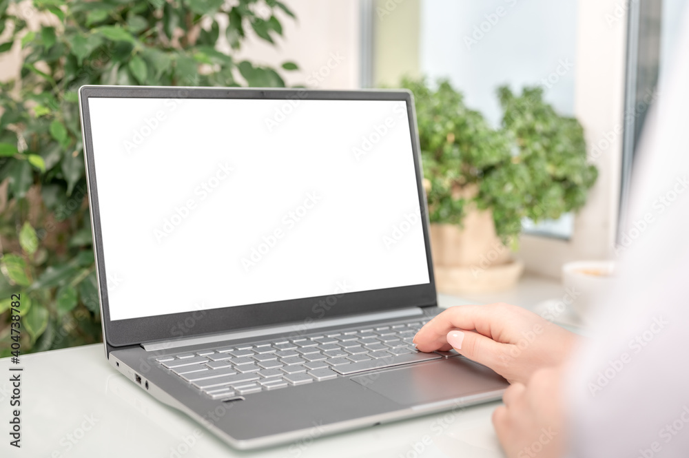 Poster mockup laptop notebook. closeup of hands using laptop with empty screen. businesswoman using noteboo
