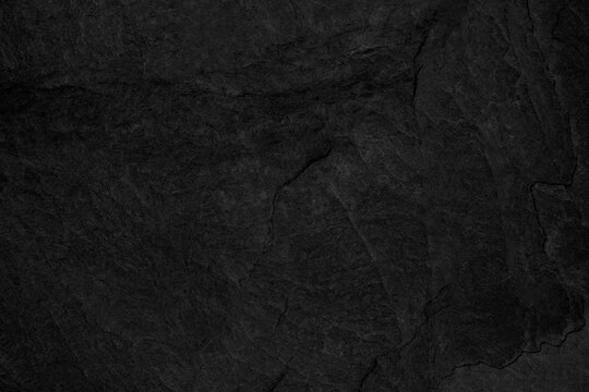 Dark grey black slate background or texture.