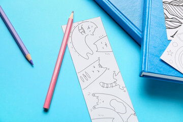 Cute bookmark with pencils and books on color background