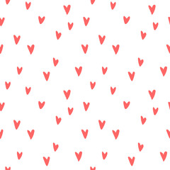 Seamless abstract pattern of small red hearts. Hand drawn doodle background, texture for textile, wrapping paper, Valentines day