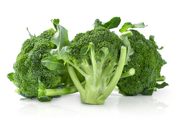 Fresh raw broccoli on white plate, close up