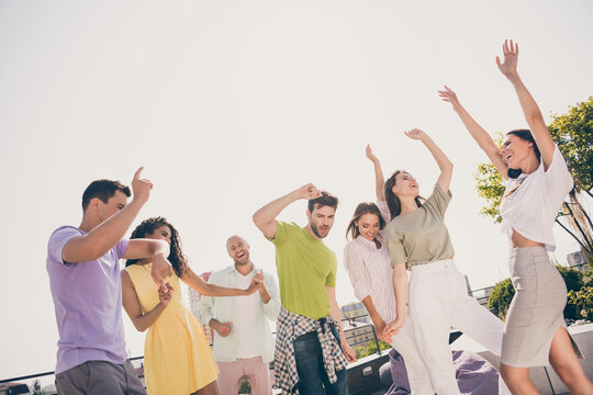 Photo Of Young Attractive Friends Enjoy Music Have Fun Chill Dance Move Hands Up Summer Rooftop Party