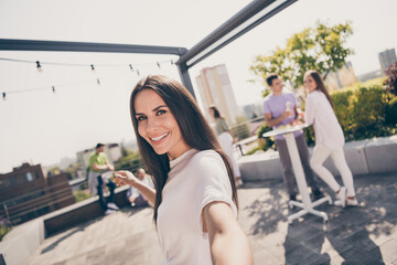 Photo of young attractive cheerful woman make photo selfie blogger happy positive smile enjoy party...