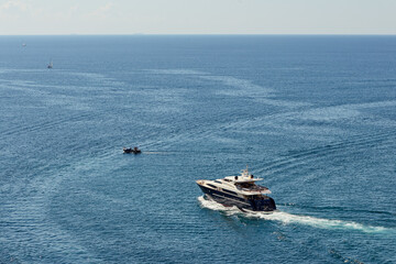 Fototapeta premium expensive black yacht on the high seas