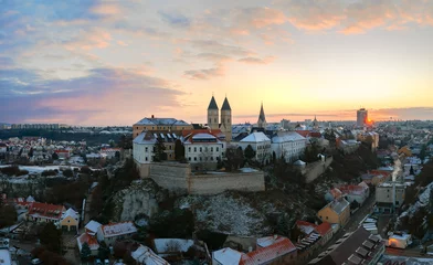 Fotobehang Veszprem city castle aera aerial photo in winter with snow. Amazing city part with historical old houses, church and much more. The most beautiful part of this city. © GezaKurkaPhotos