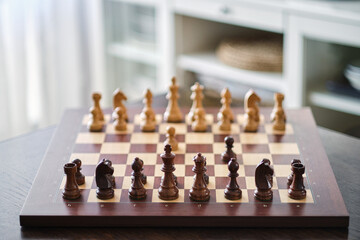 Luxury chess set. Chess pieces on the wood board.