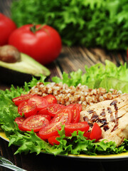 Turkey breast, avocado, salad and buckwheat as healthy lunch