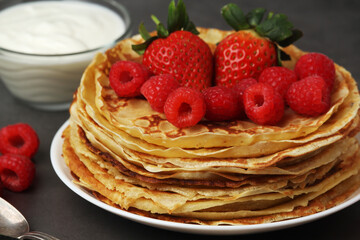 Russian cuisine national dish bliny with fresh berries