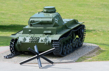 Fototapeta premium Military equipment in the memorial complex Buinichskoe Pole. Mogilev. Belarus
