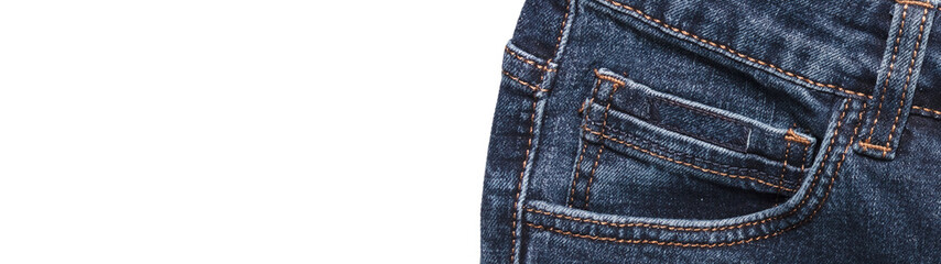 Front pocket of dark blue jeans isolated on white background. Close up shot. Copy space. Banner size. Clothing concept