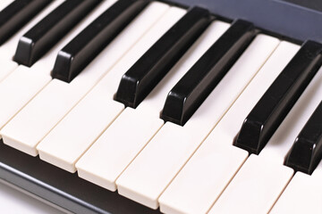 Close up of keys of electric keyboard piano 