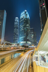 Fototapeta na wymiar High rise modern office building in downtown of Hong Kong city at night