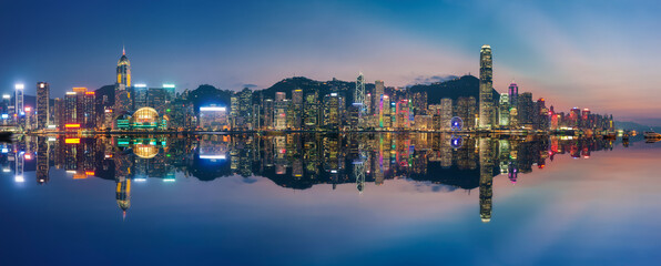 Fototapeta na wymiar Panorama of Victoria Harbor in Hong Kong at dusk