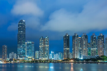 Fototapeta na wymiar Skyline and harbor of Hong Kong city at night