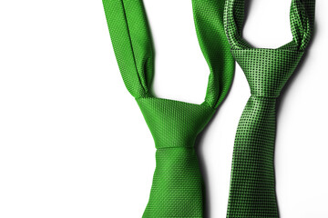 Green necktie isolated on white. Empty copy space elegant clothing background. Business meeting symbol.