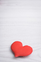Fototapeta premium Background for Valentine's Day greeting card.Valentines day concept.Red hearts on a wooden background.