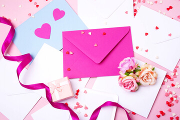Collection of message, ribbon and flowers. Valentines day concept. Flat lay style