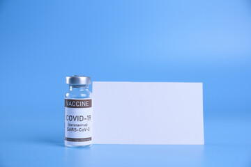 Coronavirus vaccine - The medical concept. Ampoule with Covid-19, SARS-Cov-2 vaccine. Copyspace. Vaccination, immunization, treatment to cure Covid 19 Corona Virus infection Concept