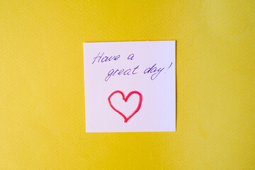 Sticker with love words written by pen, drawn heart and compliments for valentine s day  at  yellow background. 