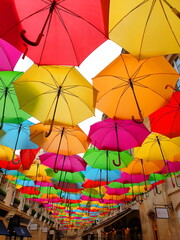 Fototapeta na wymiar colorful umbrellas over the street