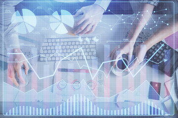 Double exposure of man and woman working together and financial chart hologram drawing. market analysis concept. Computer background. Top View.