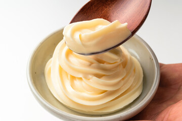 Vegetable mayonnaise on a white background